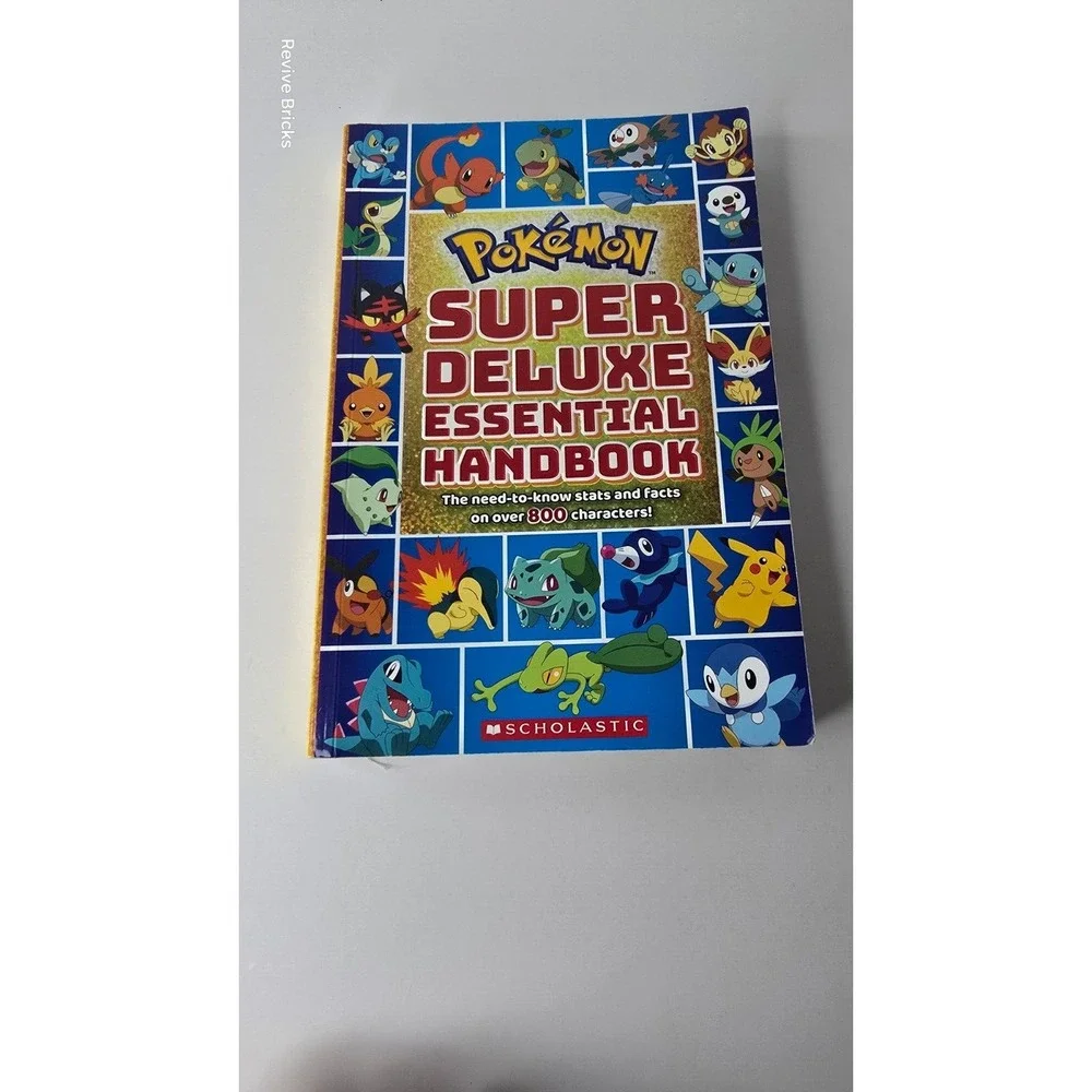 2018 Super Deluxe Essential Handbook (Pokémon): The Need-to-Know Stats and Facts